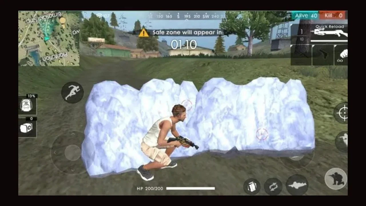 Free Fire player crouched behind an ice gloo wall during a match